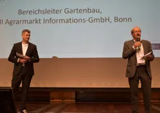 David Hintzen von GS1 Germany (links) und Dr. Hans-Christoph Behr von AMI begrüßen die Teilnehmer zur DOGK 2021.